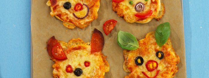 Pizzas with funny faces