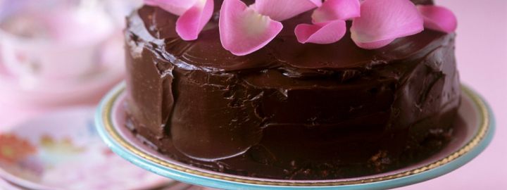 Chocolate cake with rose petals