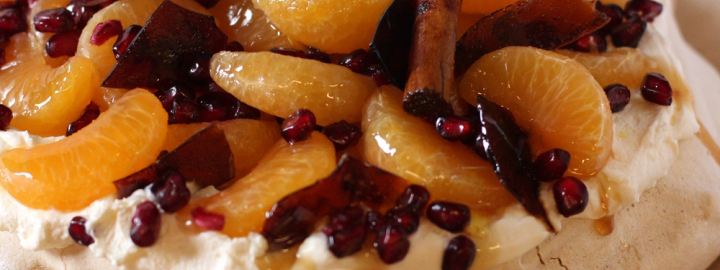 Caramelised clementine and pomegranate pavlova