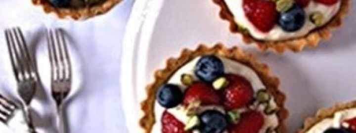 Strawberry, blueberry and pistachio tartlets
