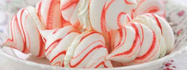 Stripy cream filled meringues