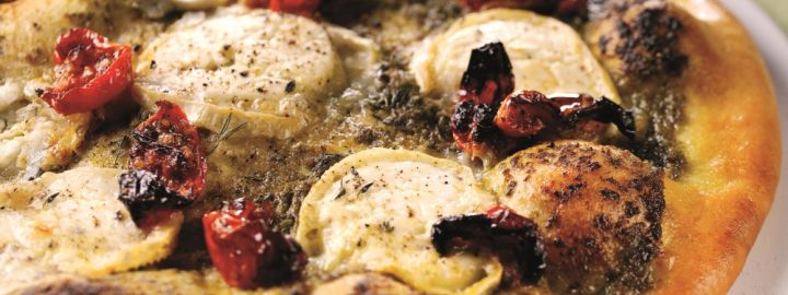 Pesto, goat's cheese and sunblushed tomato pizza | Eggcellentrecipes.com