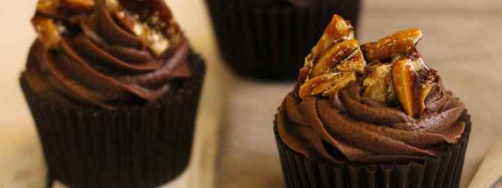 Gold praline topped chocolate cakes