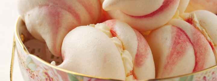 Pink swirled meringues